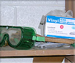 Goggles and vinyl gloves