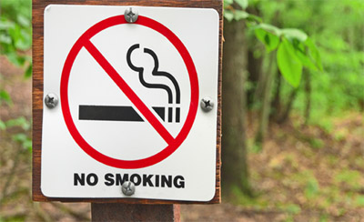 photo of a sign indicating a smoke-free public area